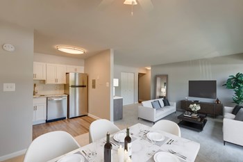 Living Room With Kitchen View Living Room With Kitchen View at Walker Mill Apartments, ZPM, District Heights - Photo Gallery 4